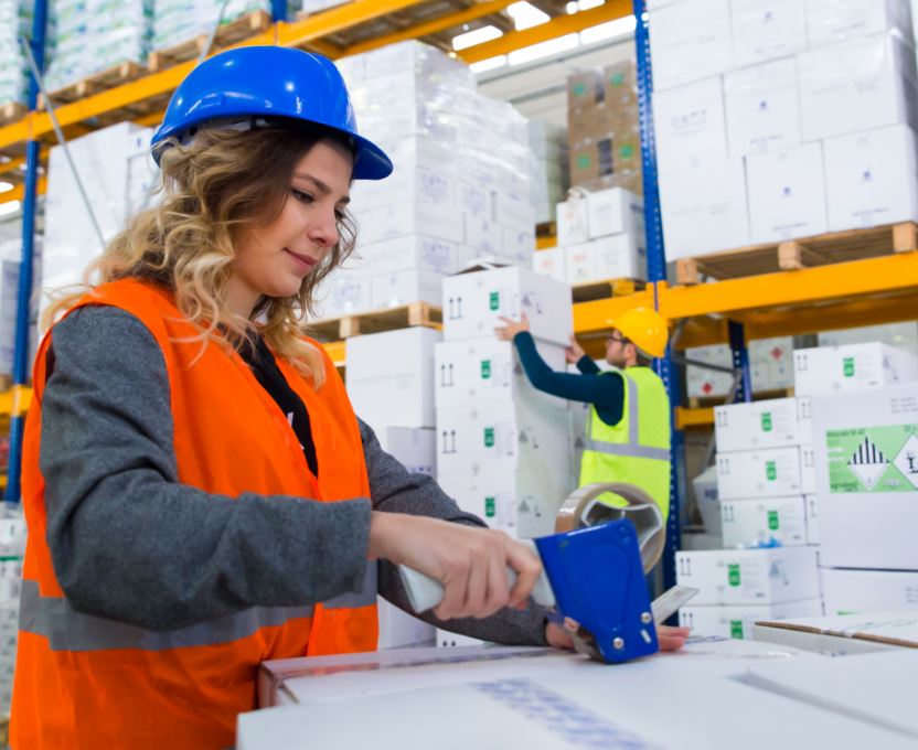 Packing, adding stickers in a logistic center 