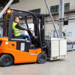 Forklift driver in a carrot company